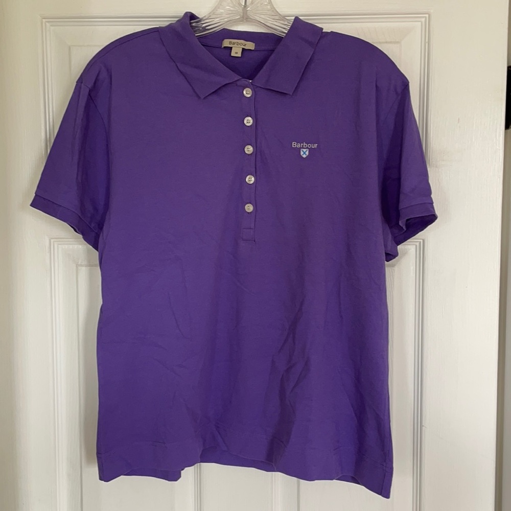 5-button purple polo shirt.